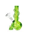 Skull-shaped soft glass bong with winding glass decor on the neck piece. Side view