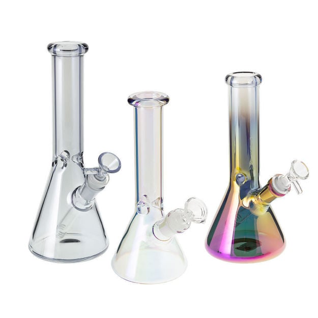 Three beaker bongs in a row. One Gray, one iridescent and one metallic purple, gold and gray.