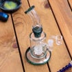 Matrix Perc Dab rig with matrix perc and gray accents on wood surface.