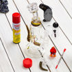Devil inline dab rig, carb cap, terp slurper, torch, dabber, butane & wax jar.	